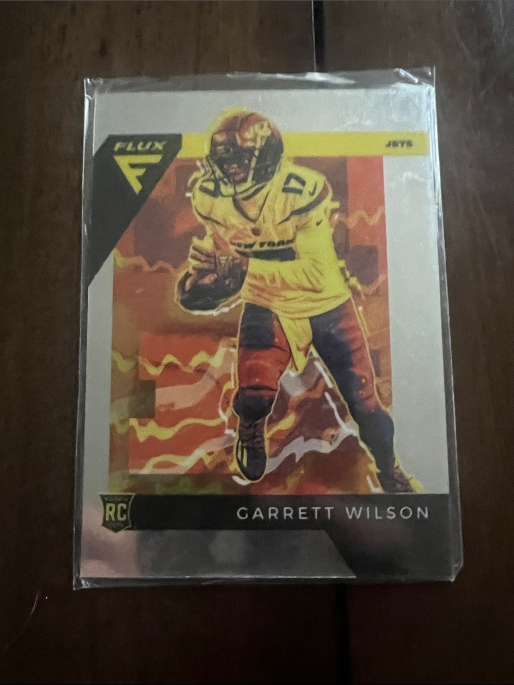 Garrett Wilson Football Rookie Card - Yellow/Orange/Red Flux Parrelel